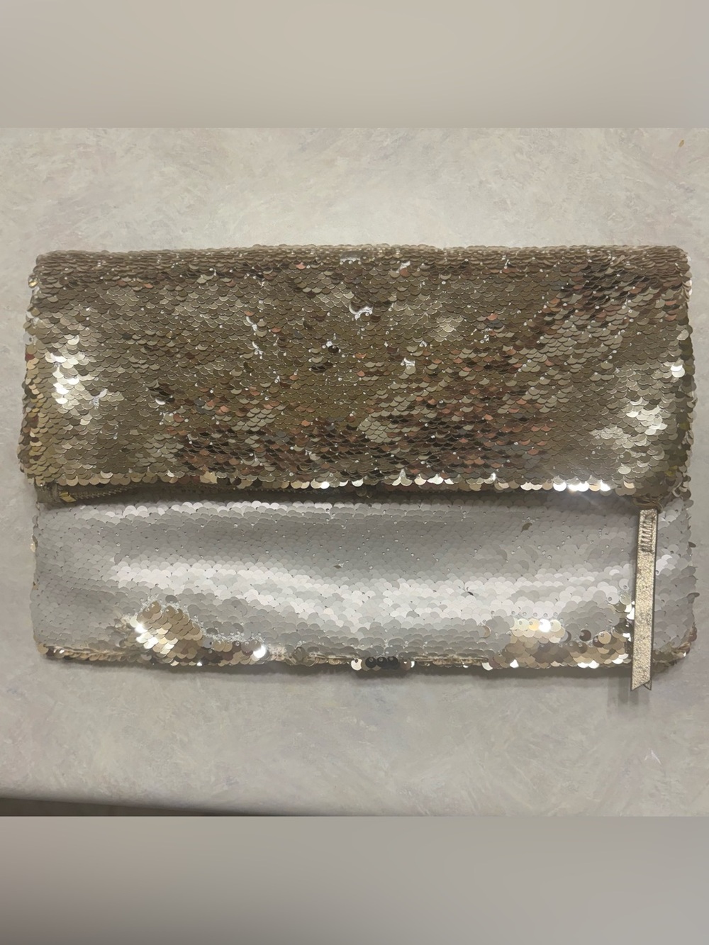Stella & Dot fold over envelope clutch: Gold and pearl white